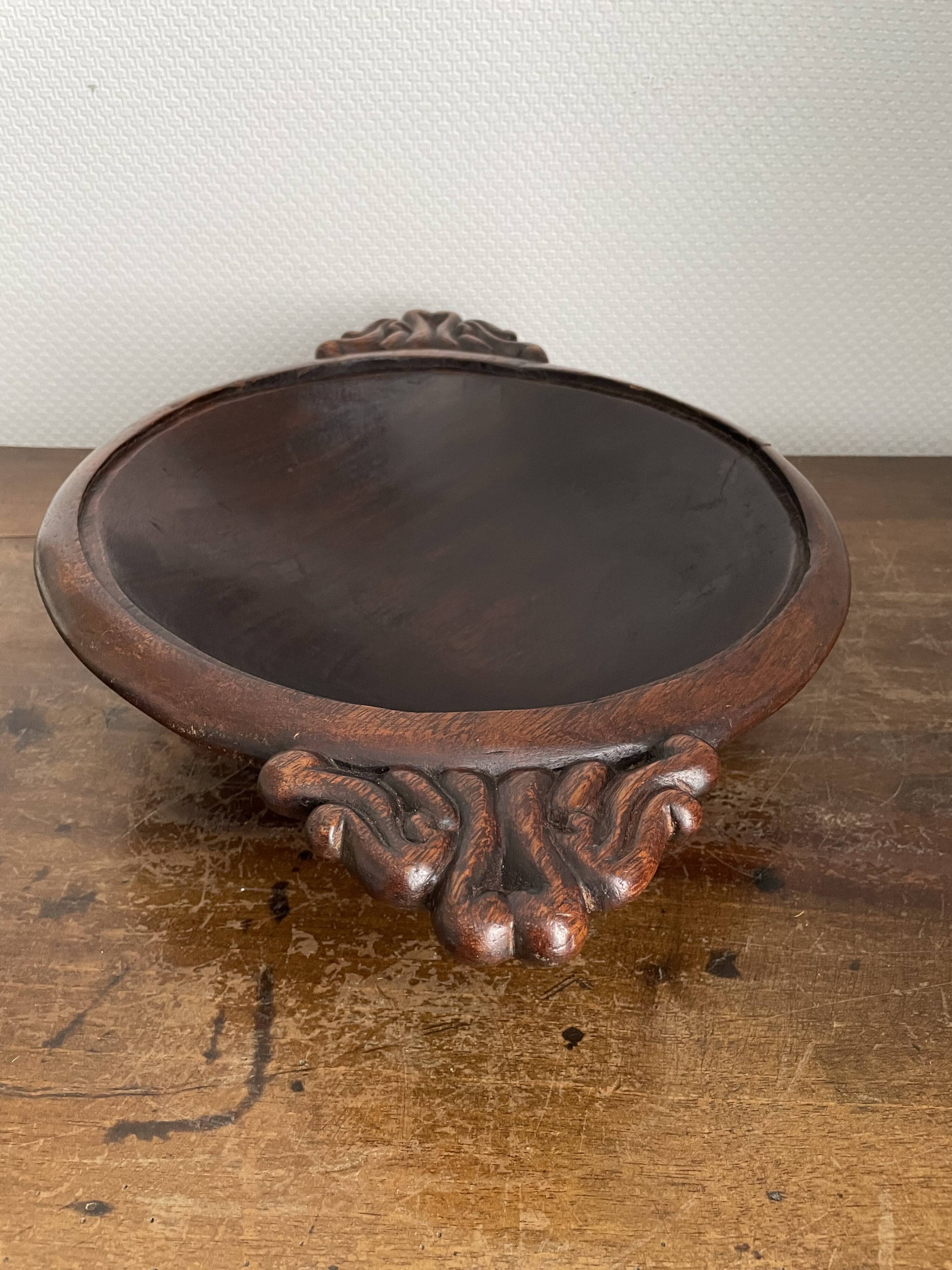 Hollow carved wooden dish