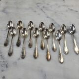 Set of 12 spoons of the middle twentieth in silver metal