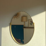 Beveled wall mirror with gold frame