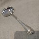 Silver-plated sauce spoon by Christofle silversmiths, Louis XVI ribbons
