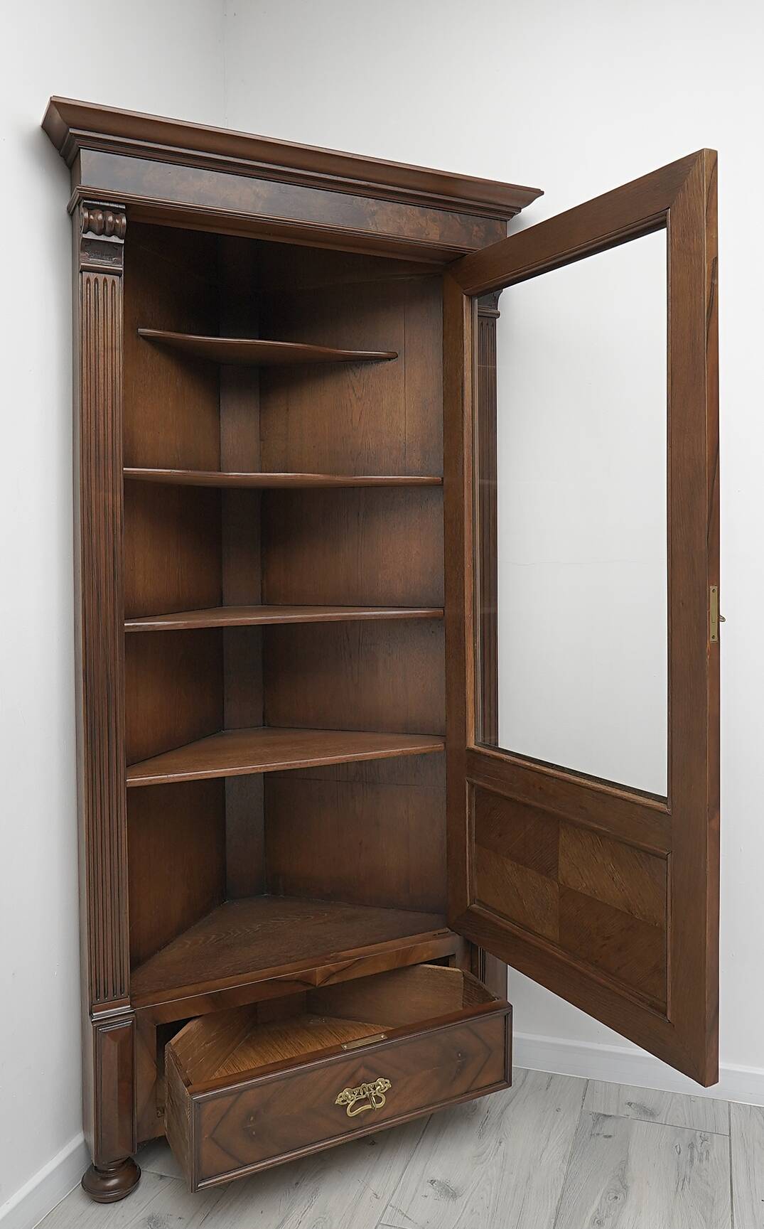 Antique French corner bookcase. After professional renovation.