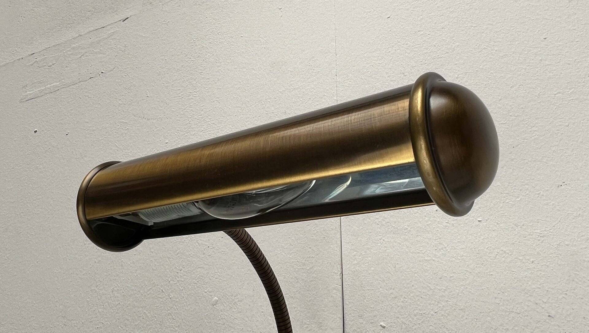 Vintage German brass patinated wall lamp with a gooseneck design by Honsel, 1970s.