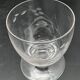 Set of fine glass stemmed glasses with small flower patterns