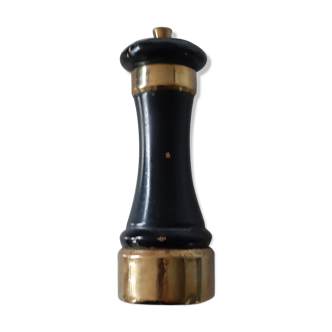 Wood and brass pepper mill