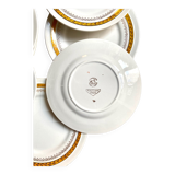 8 assiettes à dessert St Amand en faïence jaune et dorée