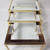 Three trundle tables gilded brass and silver 60s