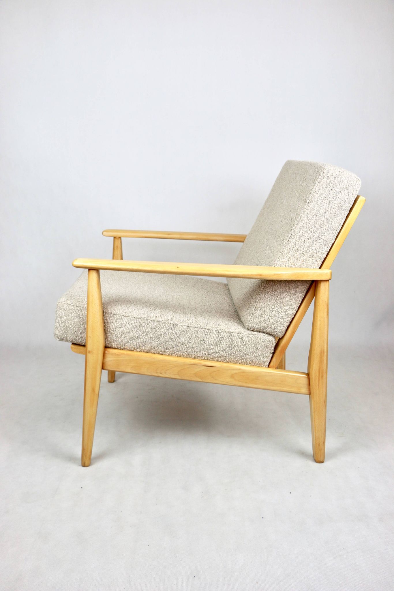 Vintage Danish armchair, 1970s, beige boucle - light wood - 2 pieces available