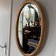Miroir doré ovale ancien glace biseautée