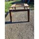 1960s oak dining table with integrated extensions.