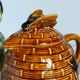 Set of old teapots and honey pot