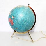 Luminous world map in tripod glass