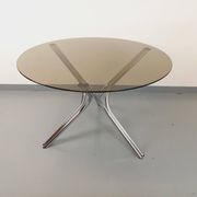 Vintage round dining table in smoked glass and chromed metal, Space Age style, from the 70s