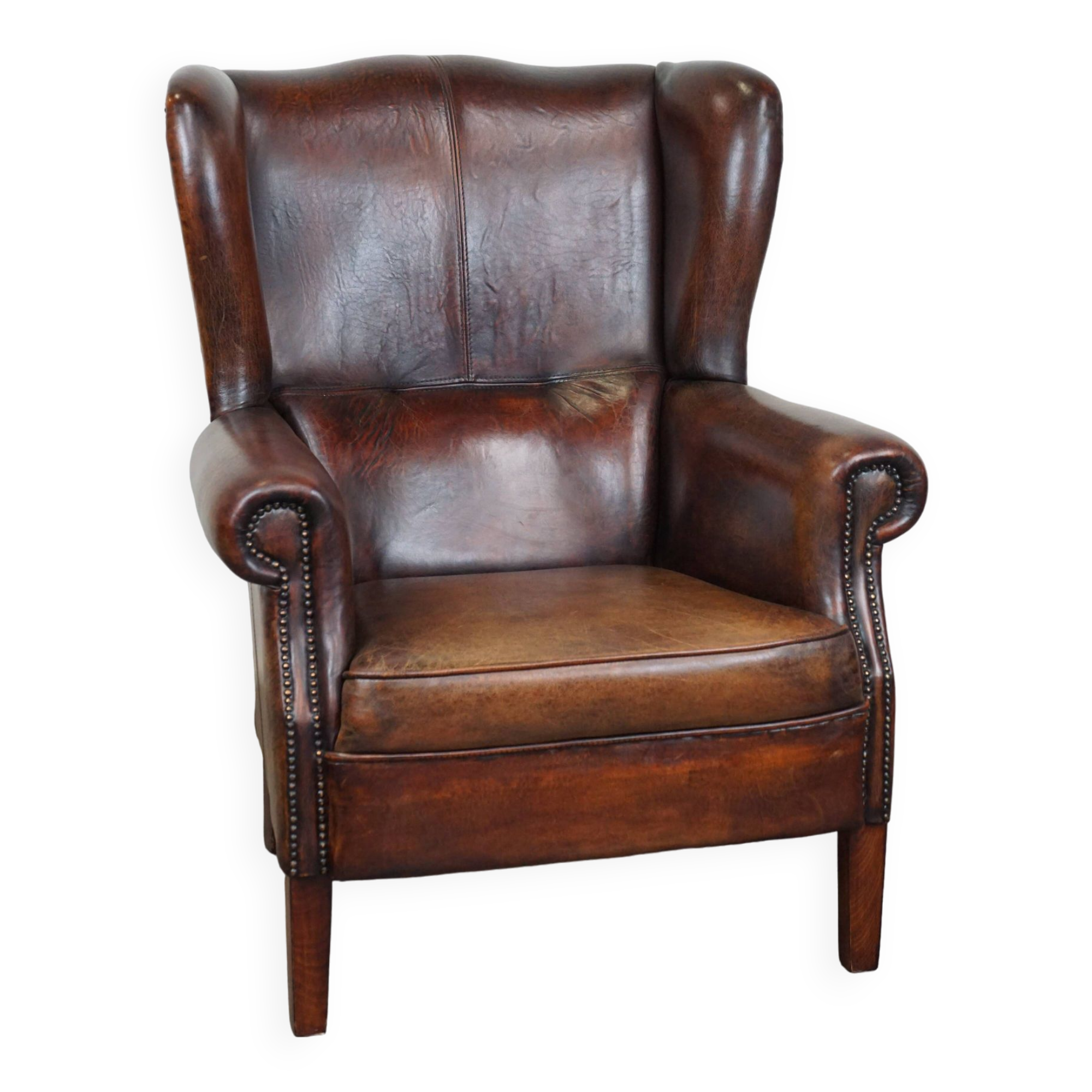Large Sheepskin Leather Wingback Armchair with a Fixed Seat Cushion and a Stunning Patina