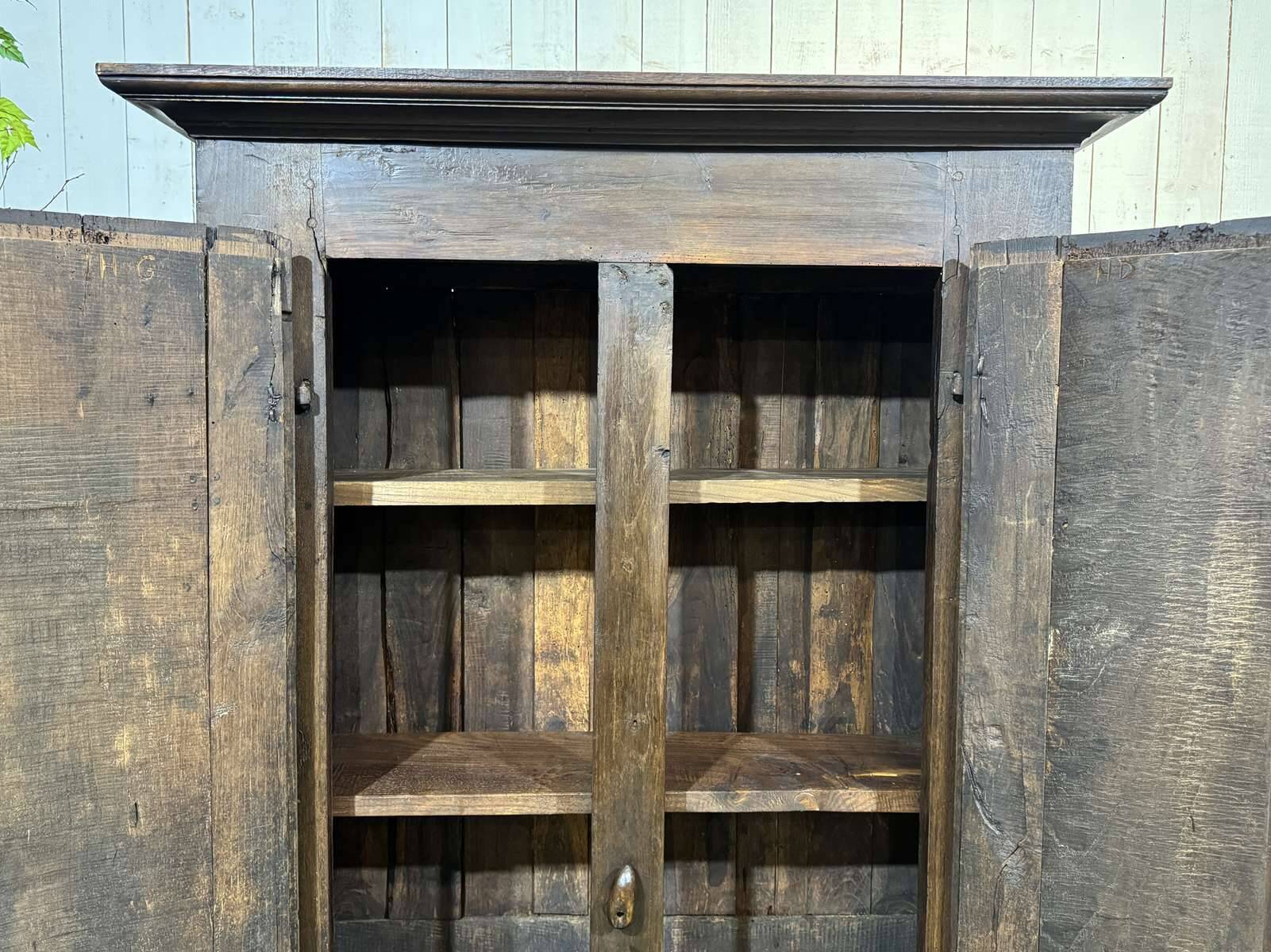 Entrance furniture, Breton wardrobe in oak and chestnut from the 19th century.
