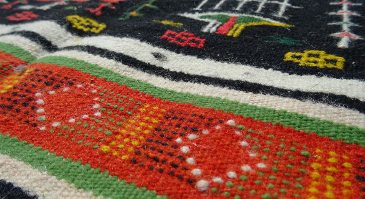 Hand woven wool rug 125x70cm