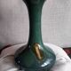 Vintage ceramic vase with a very original design.