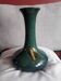 Vintage ceramic vase with a very original design.