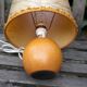 Light wood round foot laying lamp and old lampshade