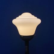 Standing copper table lamp with glass shade