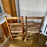 Set of wooden and straw chairs