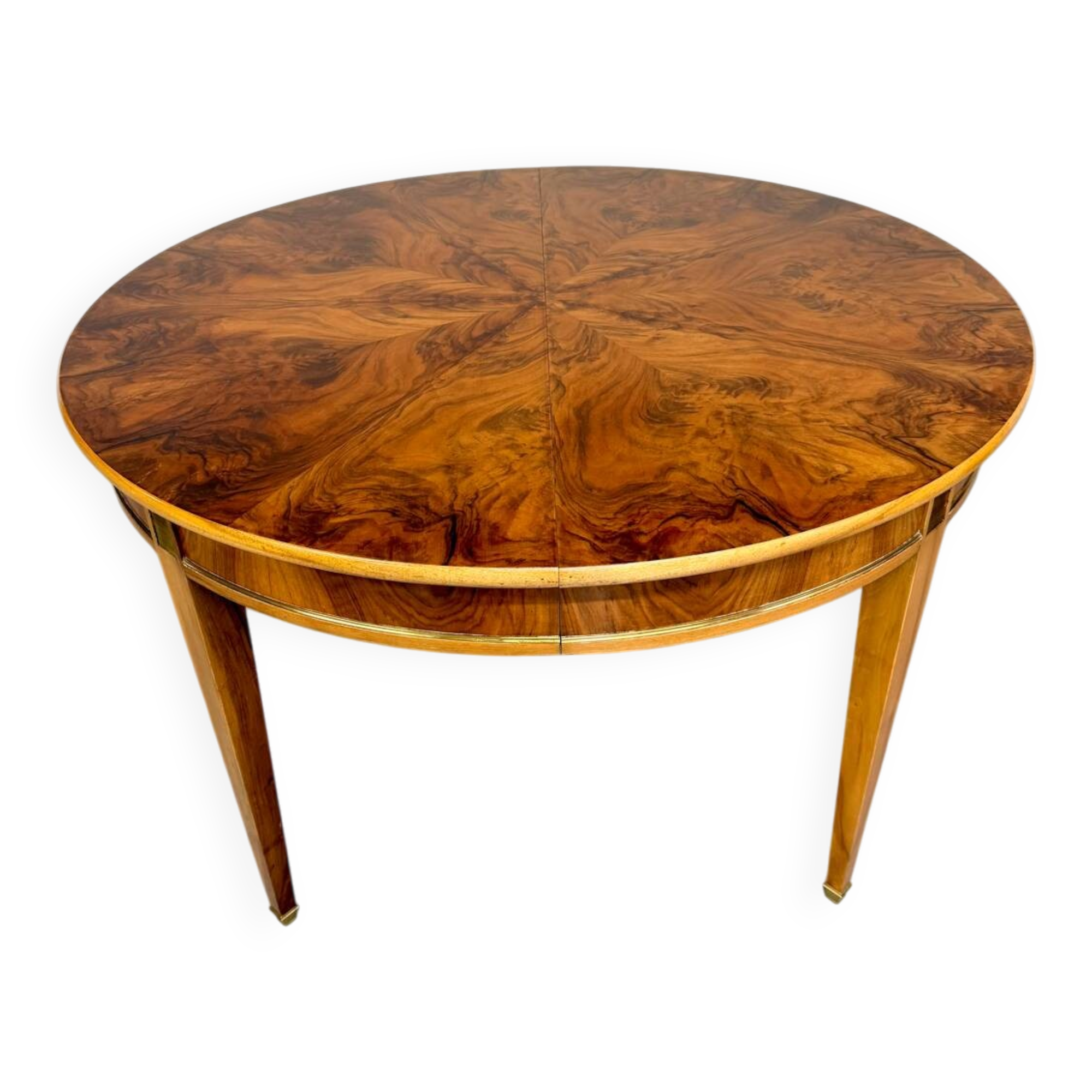 Round walnut Napoleon III extendable table with bronze top in good condition.