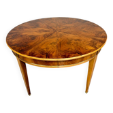 Round walnut Napoleon III extendable table with bronze top in good condition.