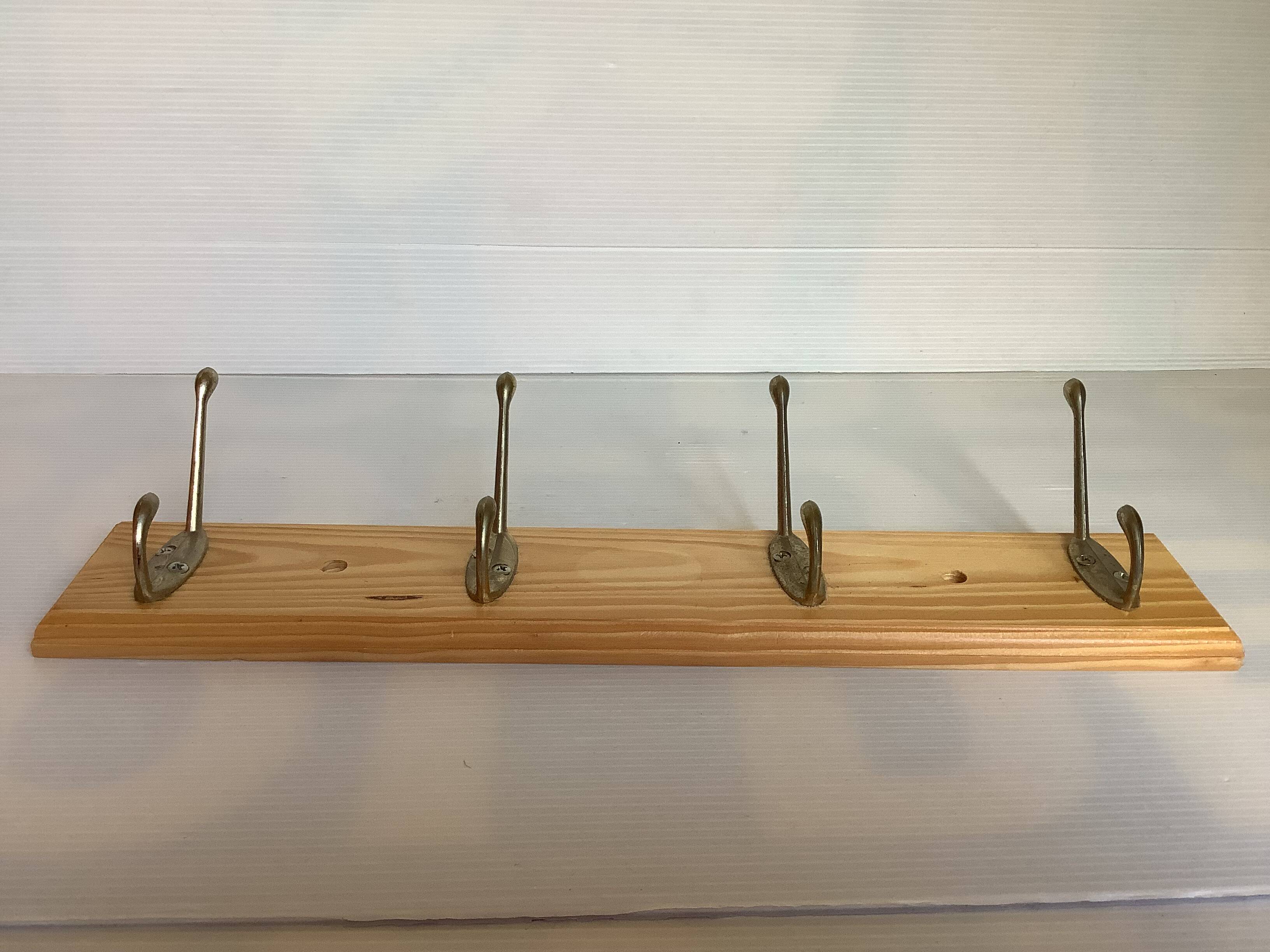Wooden coat rack with four hooks
