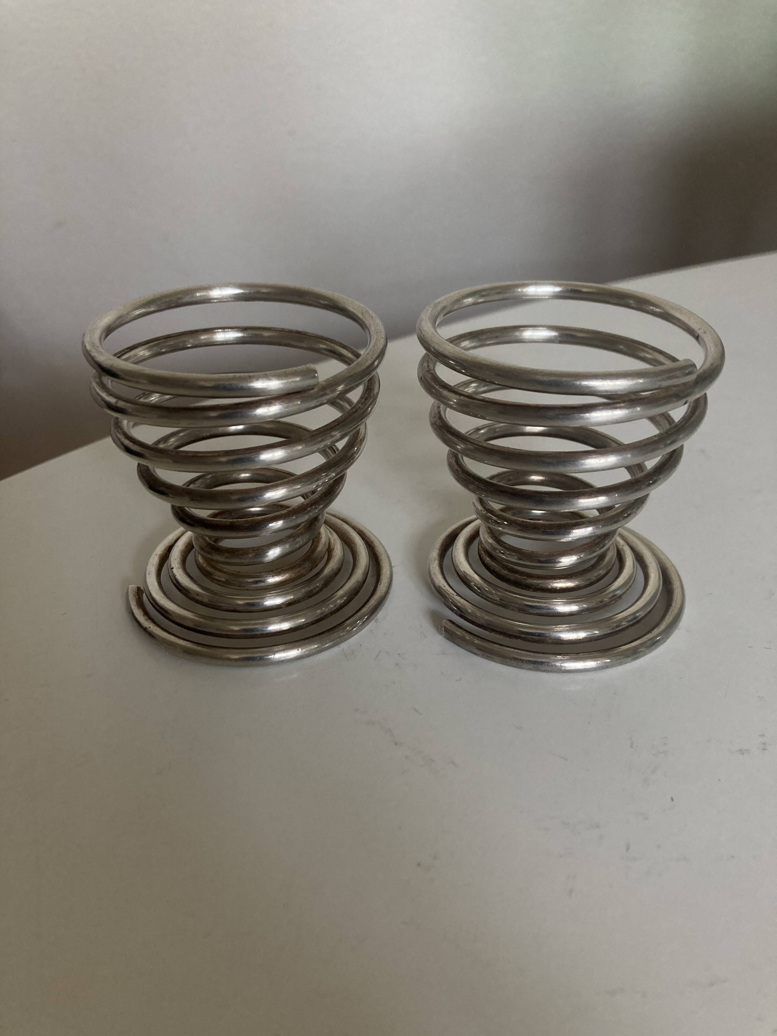 Pair of spring egg cups in silver metal 1970