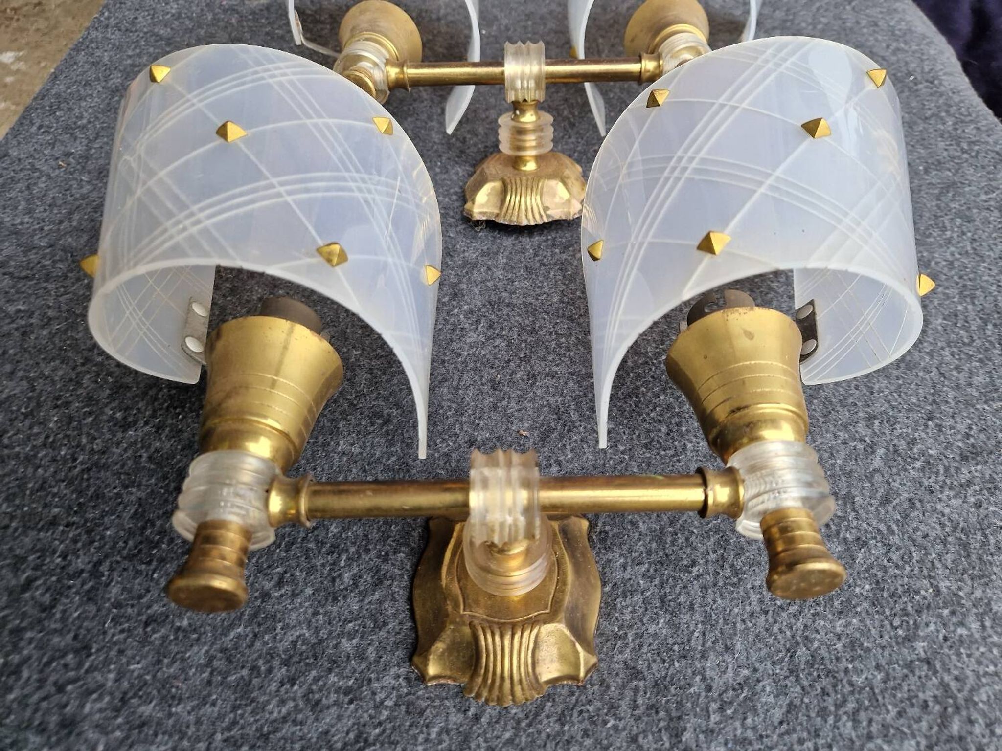 Pair of plastic and brass wall lights from the 60s/70s.