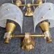 Pair of plastic and brass wall lights from the 60s/70s.