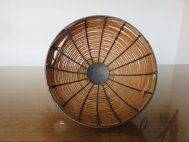Standing fruit basket in rattan and black lacquered metal 1970