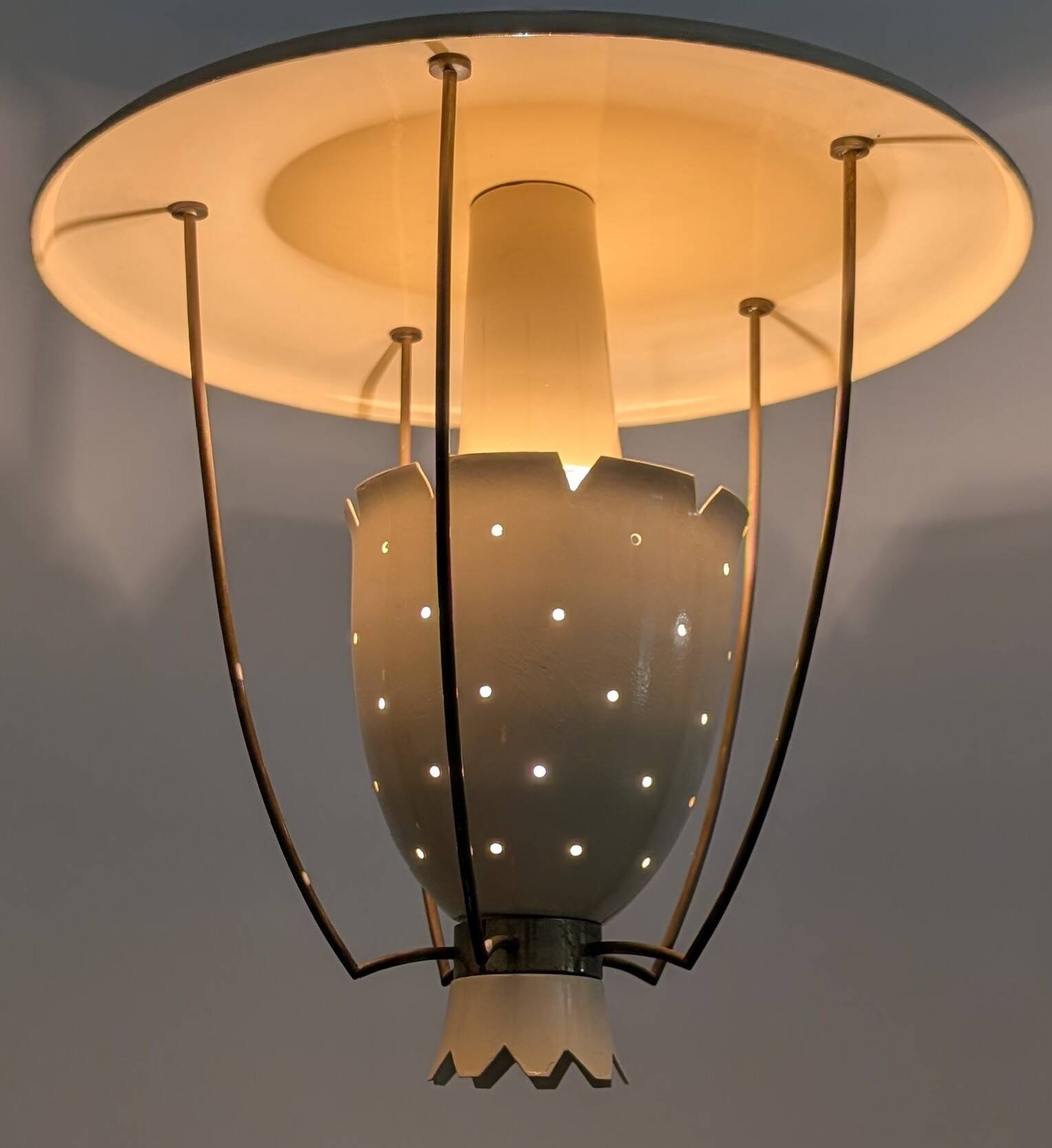 Perforated metal pendant lamp with brass details, Italy, 1940s