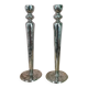 Pair of hammered metal candlesticks