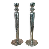 Pair of hammered metal candlesticks