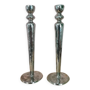 Pair of hammered metal candlesticks
