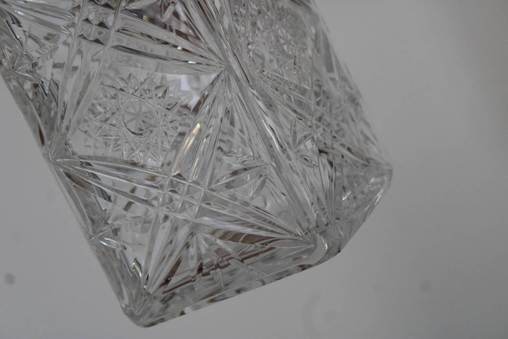 Antique cut glass carafe, probably crystal – Geometric patterns and matching stopper.