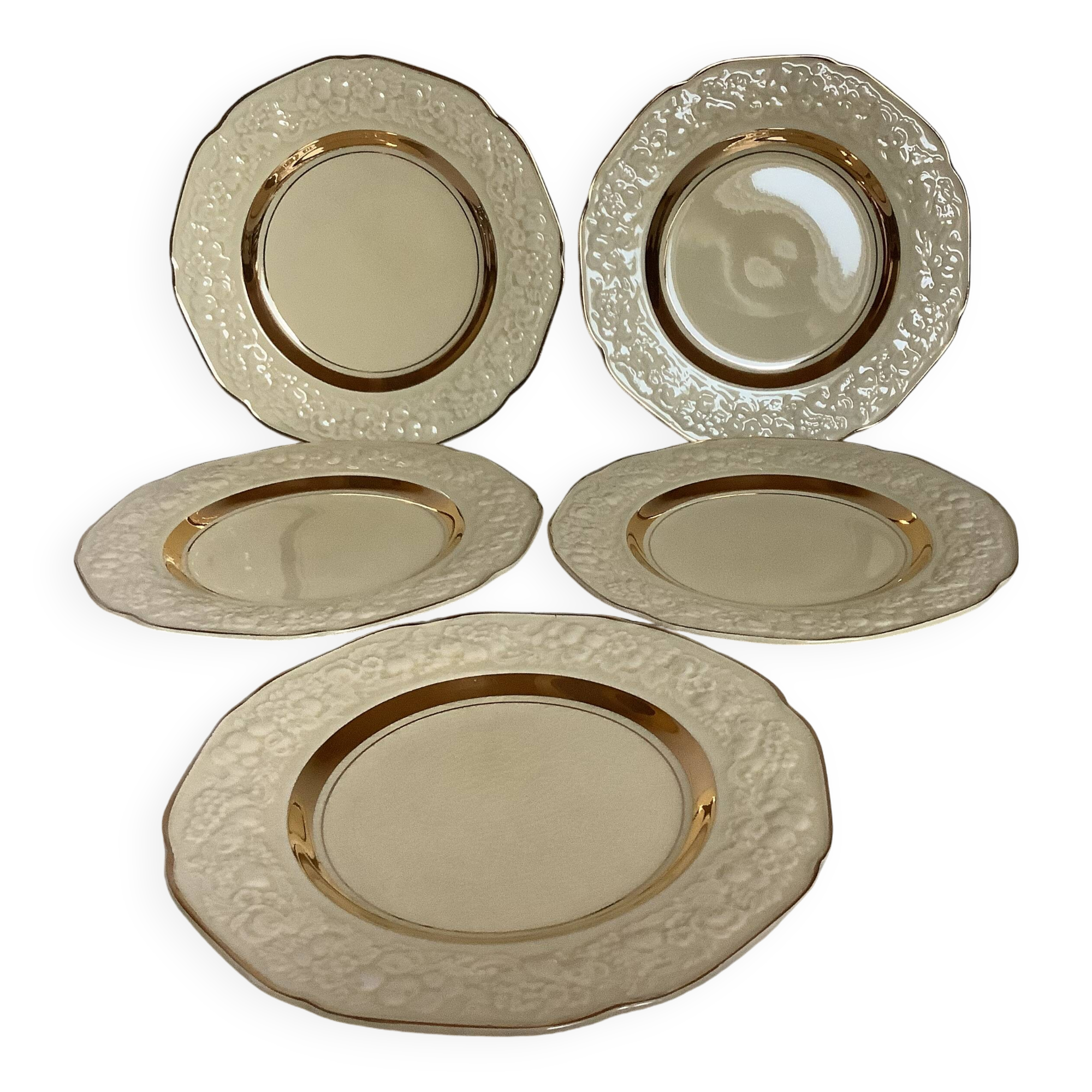 Five small floral plates England