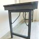 Table pliante dans son jus