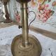 Brass pusher candle holder on oval frame
