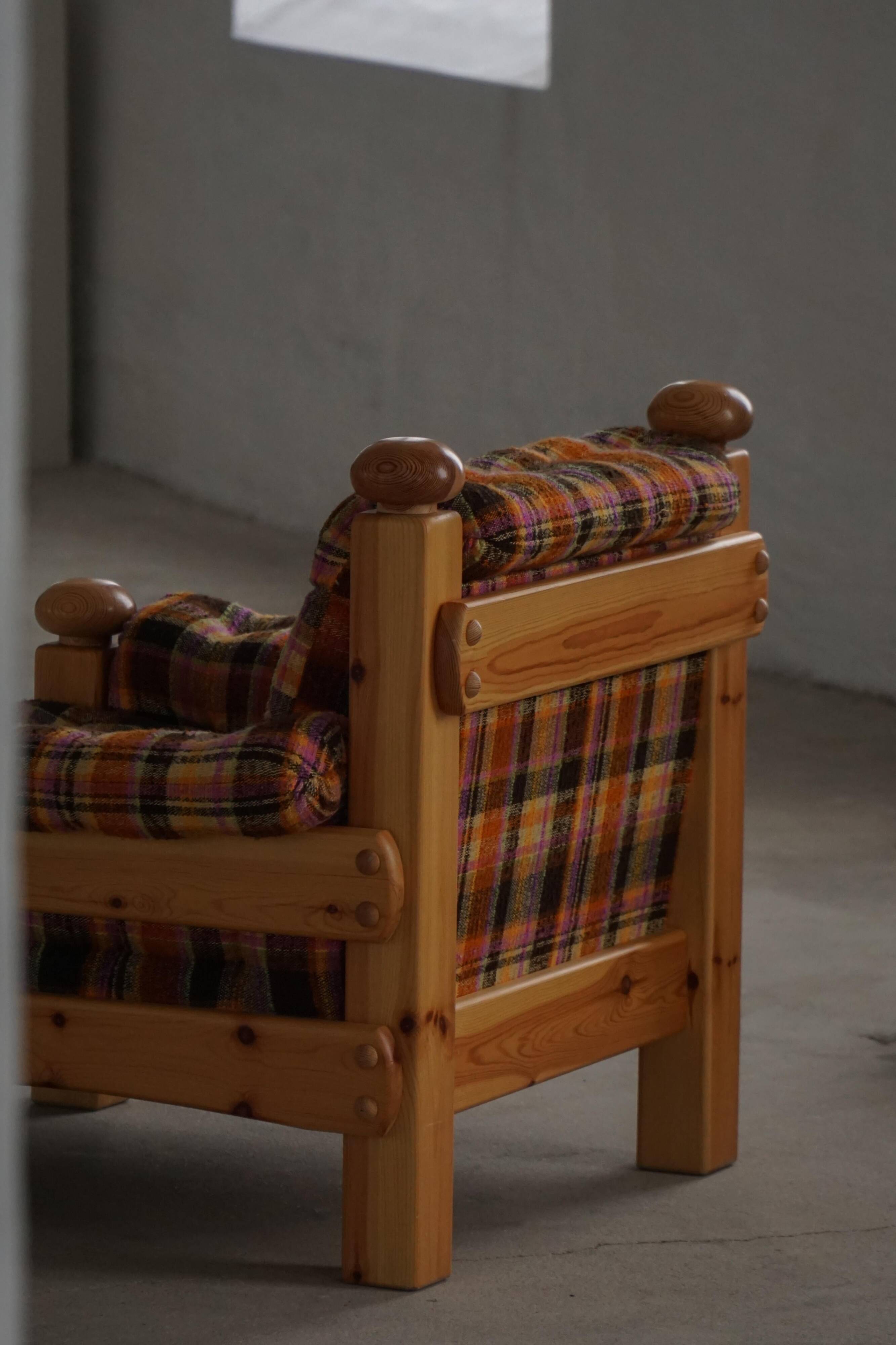 Brutalist lounge chair in solid pine, Swedish modern, made in the 1970s.