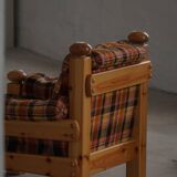 Brutalist lounge chair in solid pine, Swedish modern, made in the 1970s.