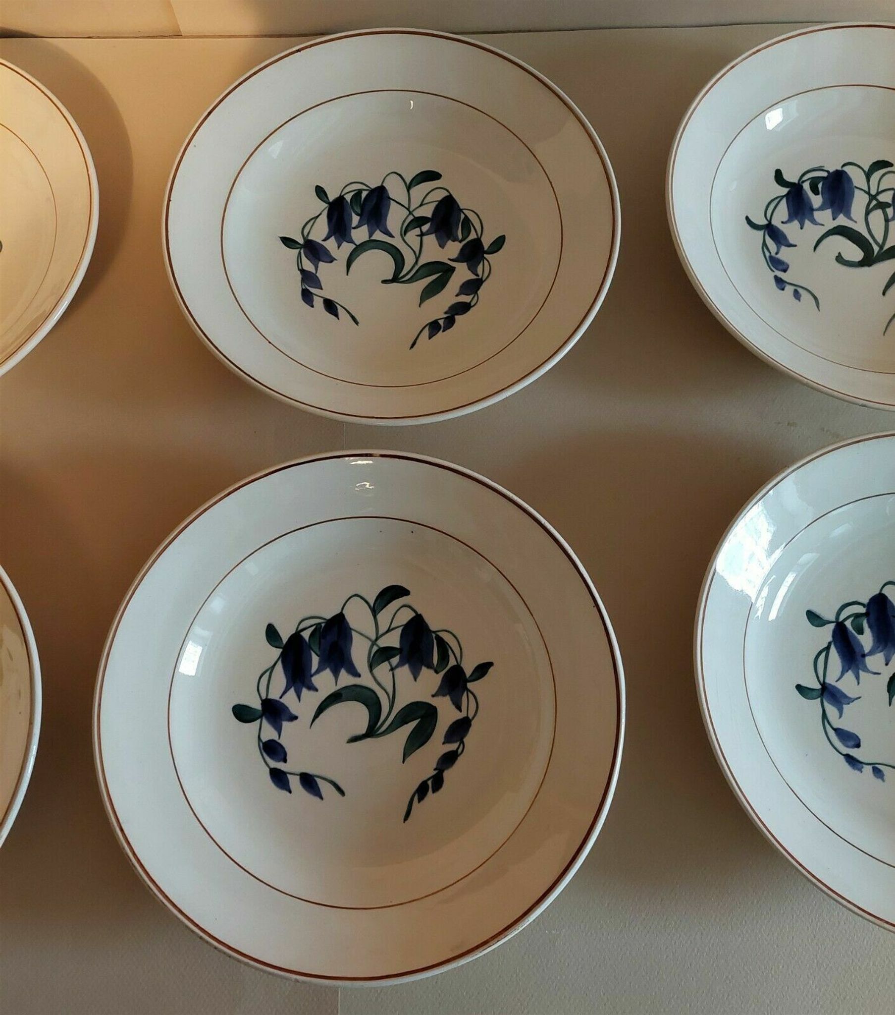 Assiettes creuses série de six faïence de Longchamp décor Simone
