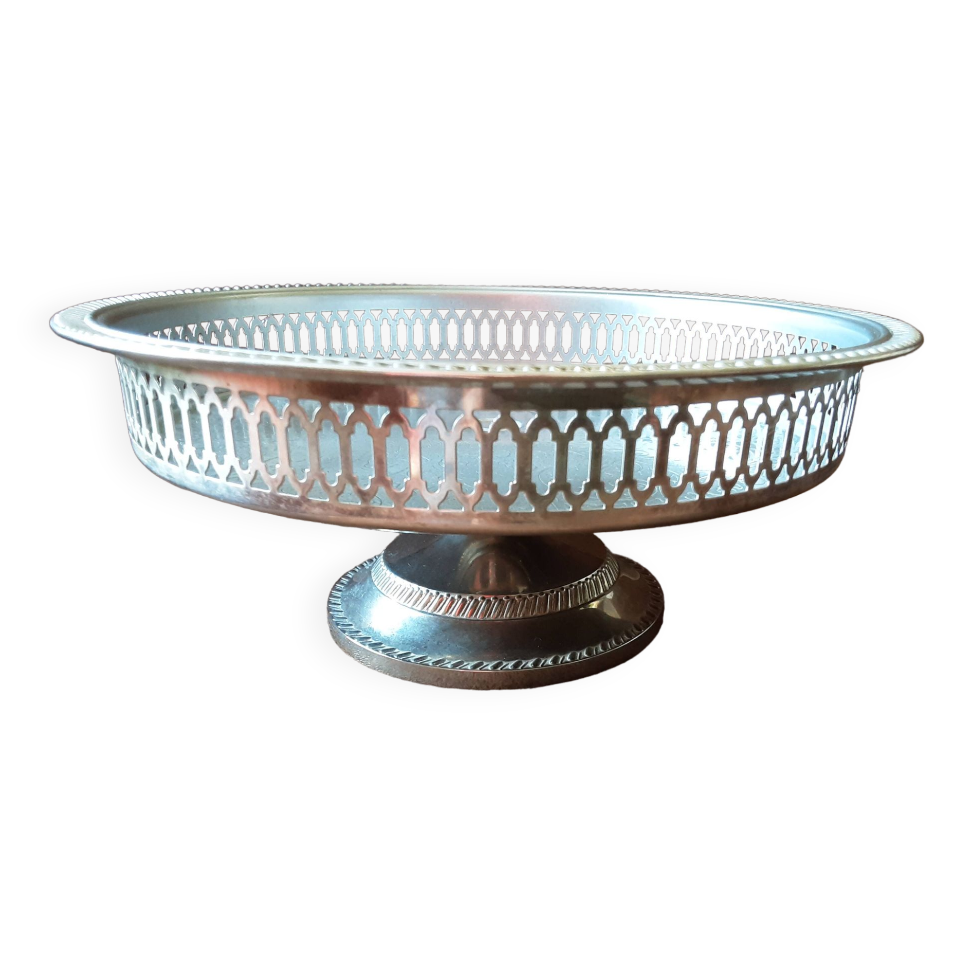 Old metal bowl on foot
