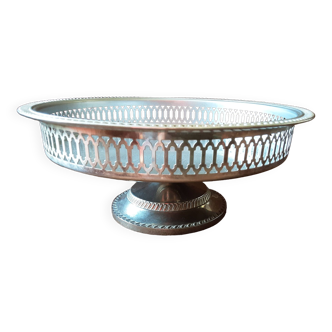 Old metal bowl on foot