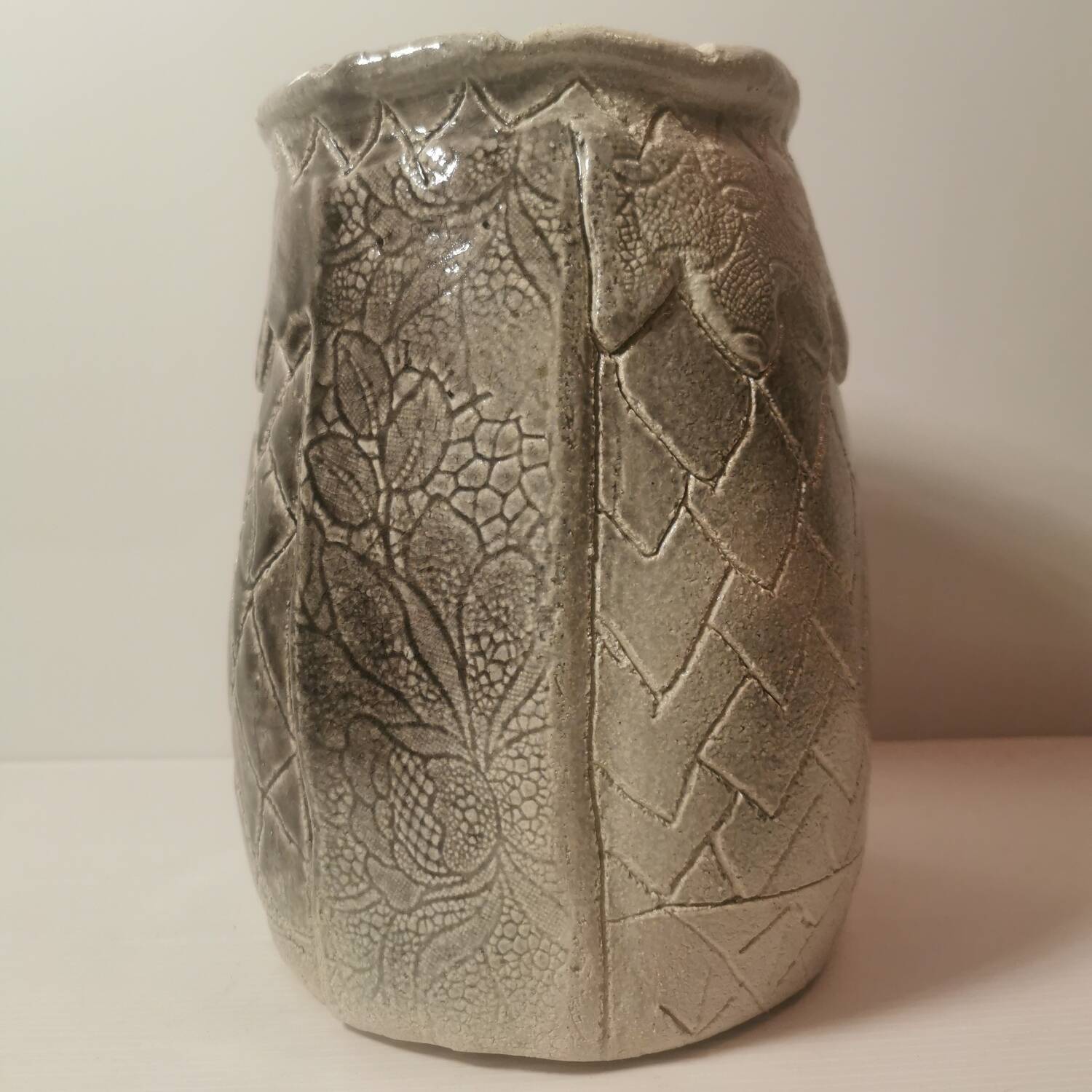 Ceramic vase or pot in gray beige color