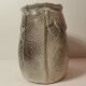 Ceramic vase or pot in gray beige color
