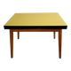 Table formica jaune et pieds bois années 50