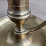 Hand candlestick with brass fitter