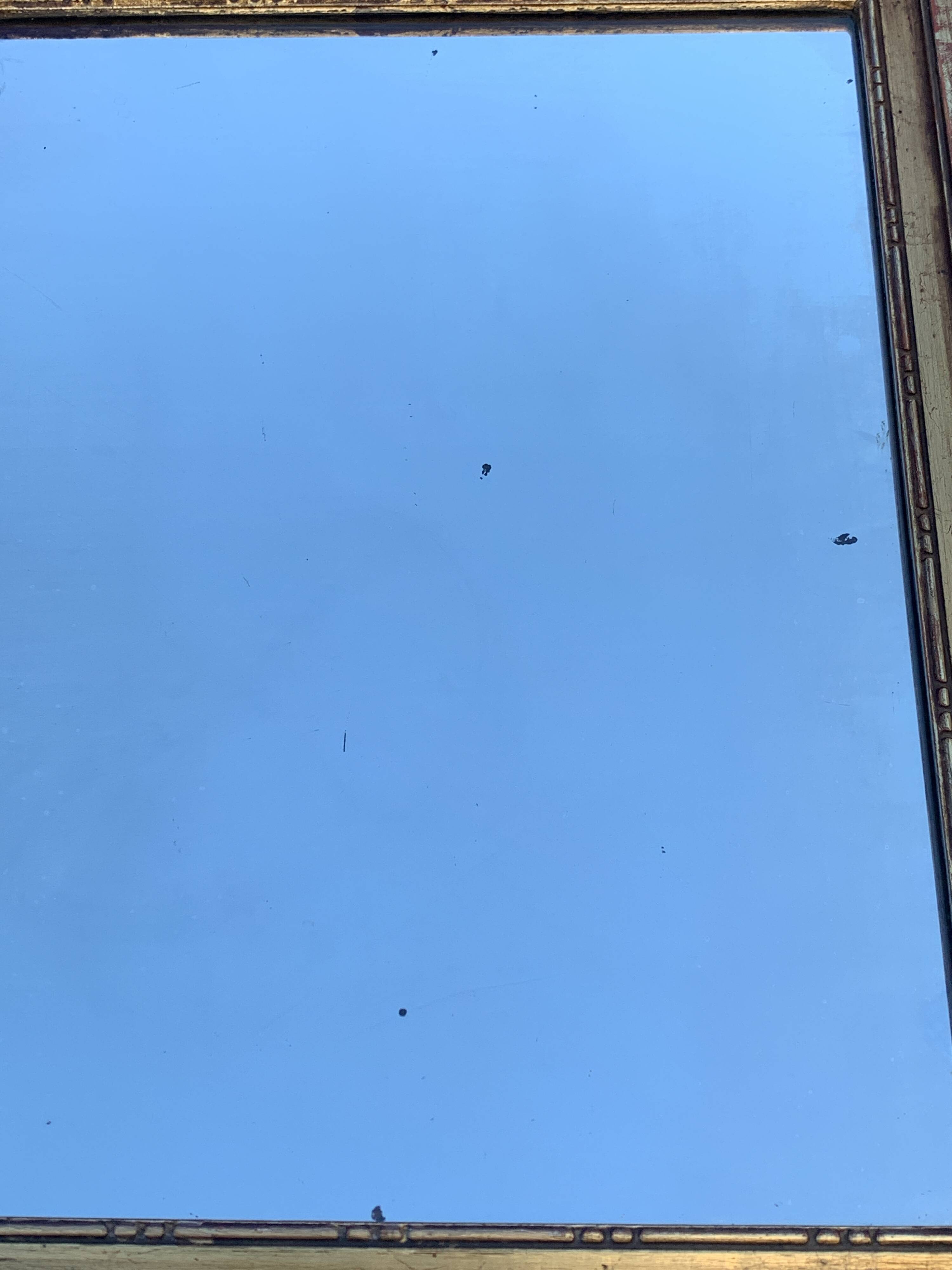 Antique mirror with gilded wood pediment, Louis XVI style