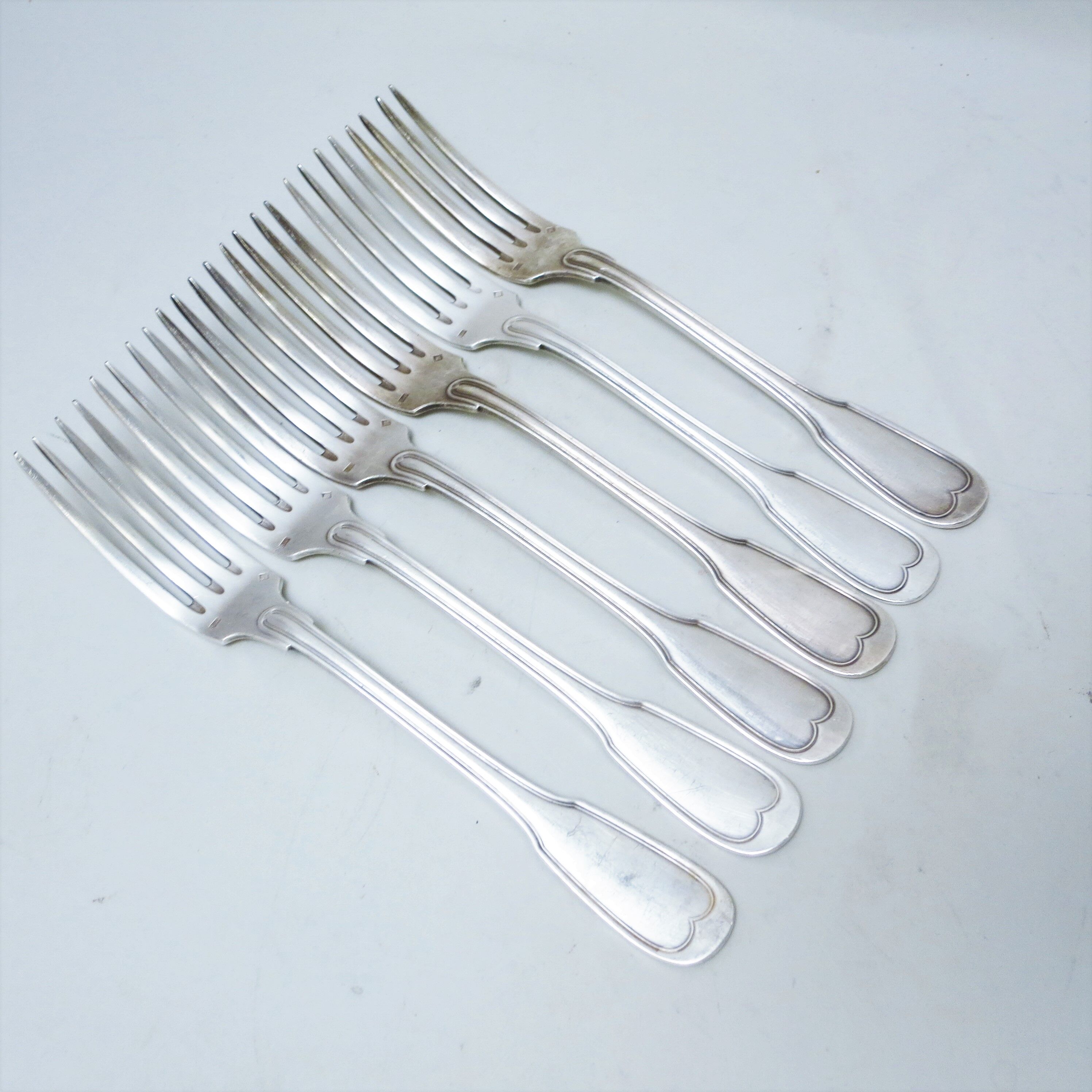 Set of six forks in silver metal mesh model